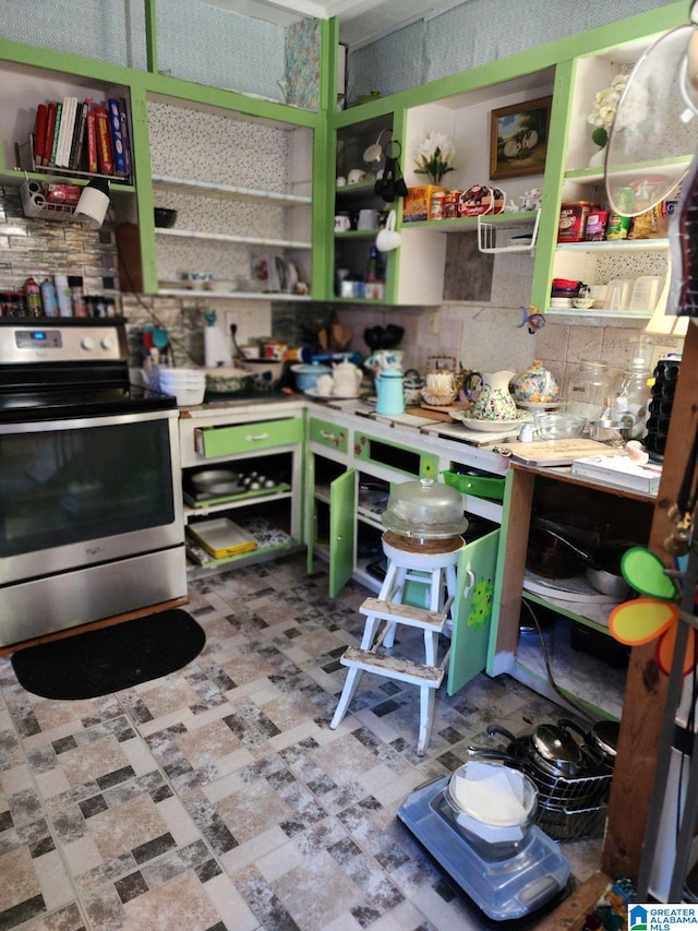 718 Blue Ridge Dr, Anniston, AL 36207 - kitchen with electric stove, open shelves, and tile patterned floors