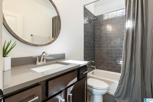 full bathroom with shower / bath combo, vanity, crown molding, tile patterned flooring, and toilet