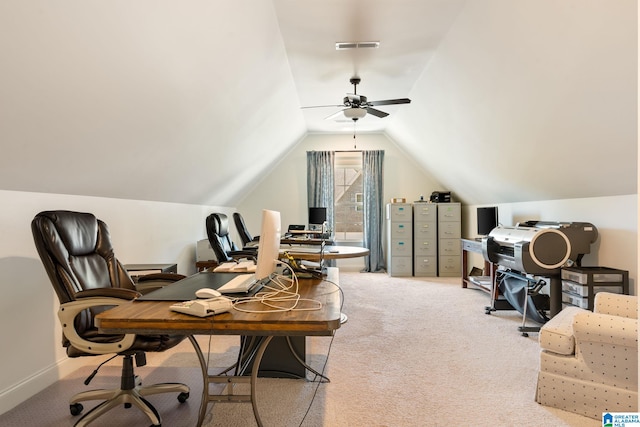 office featuring ceiling fan, light carpet, and lofted ceiling