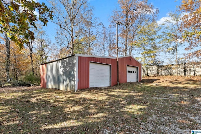 garage with a yard