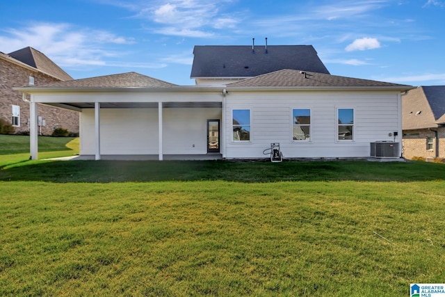 1114 Eagle Nest Cir, Birmingham, AL 35242 - back of property with a yard, central AC, a patio area, and roof with shingles