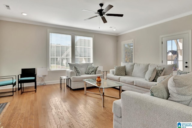 1114 Eagle Nest Cir, Birmingham, AL 35242 - living room featuring ornamental molding, plenty of natural light, ceiling fan, light wood-type flooring, and baseboards