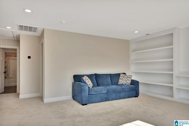 1114 Eagle Nest Cir, Birmingham, AL 35242 - carpeted living room with attic access, baseboards, recessed lighting, and built in shelves