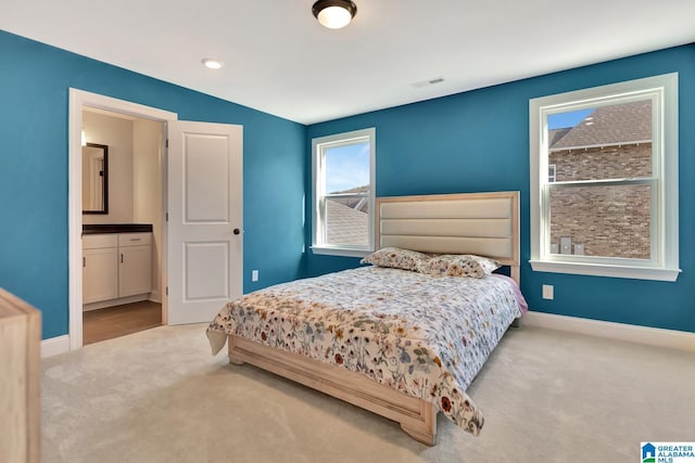 1114 Eagle Nest Cir, Birmingham, AL 35242 - carpeted bedroom with baseboards and ensuite bath
