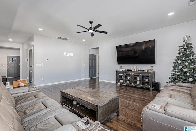 living room with dark hardwood / wood-style floors and ceiling fan