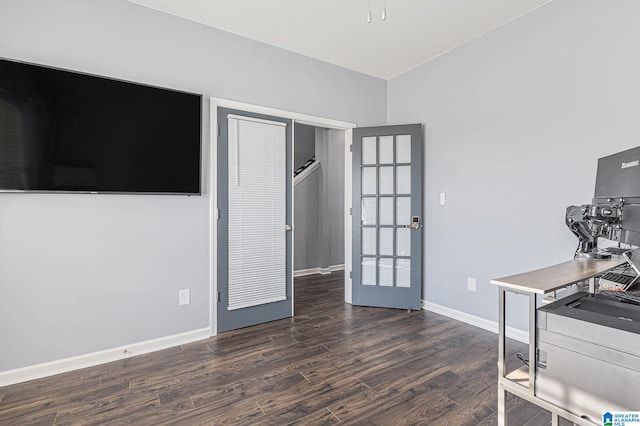 unfurnished office with dark hardwood / wood-style flooring