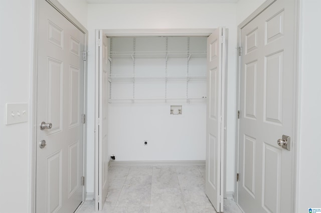 washroom featuring hookup for an electric dryer and hookup for a washing machine