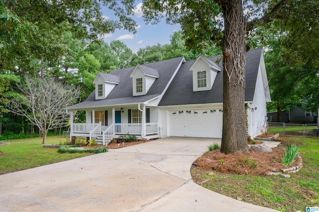 cape cod-style house with a porch, a garage, and a front lawn