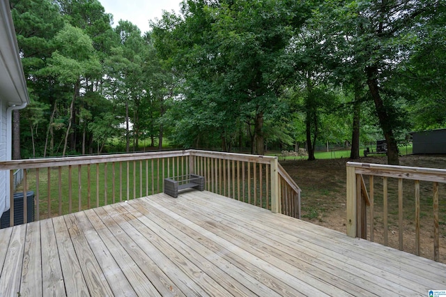 deck featuring a lawn