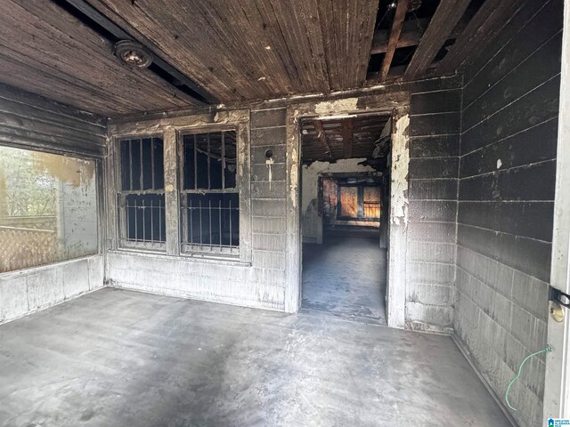 interior space featuring wood ceiling