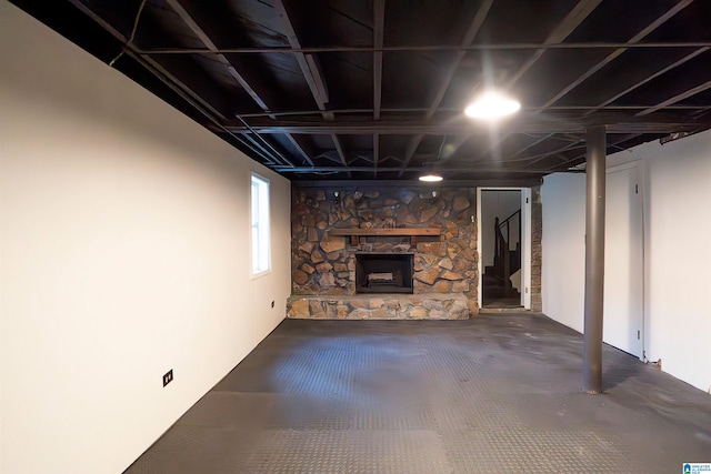 basement featuring a fireplace