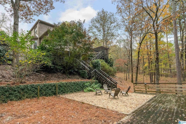 view of yard with a fire pit