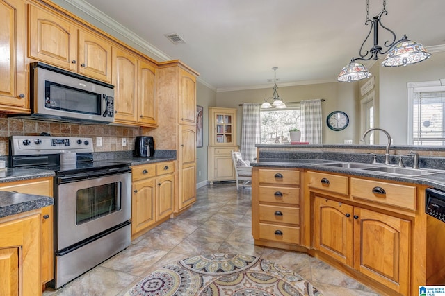 kitchen with pendant lighting, backsplash, crown molding, sink, and appliances with stainless steel finishes