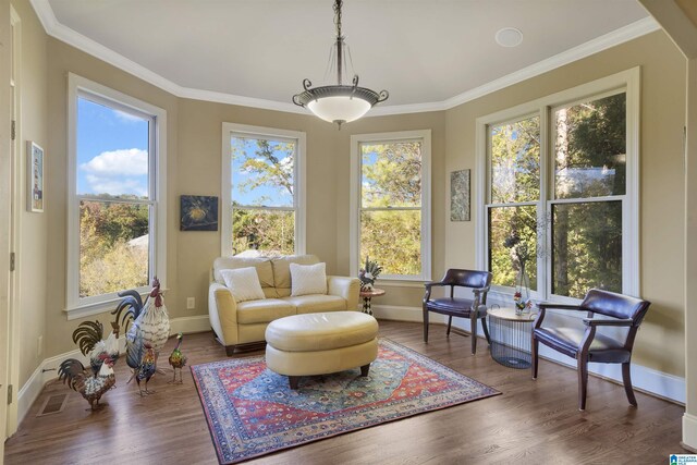 2399 Huntington Glen Dr, Homewood, AL 35226 - living area with baseboards, crown molding, and wood finished floors