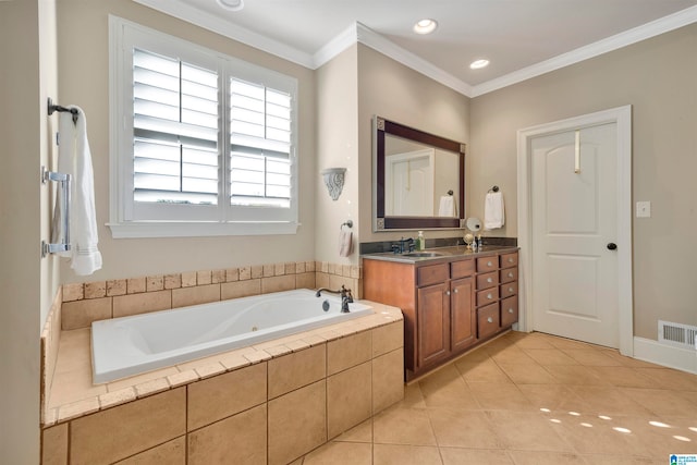 bathroom featuring vanity, tiled bath, tile patterned floors, and crown molding