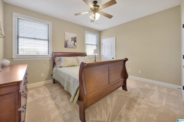 2399 Huntington Glen Dr, Homewood, AL 35226 - bedroom featuring light carpet, baseboards, and ceiling fan