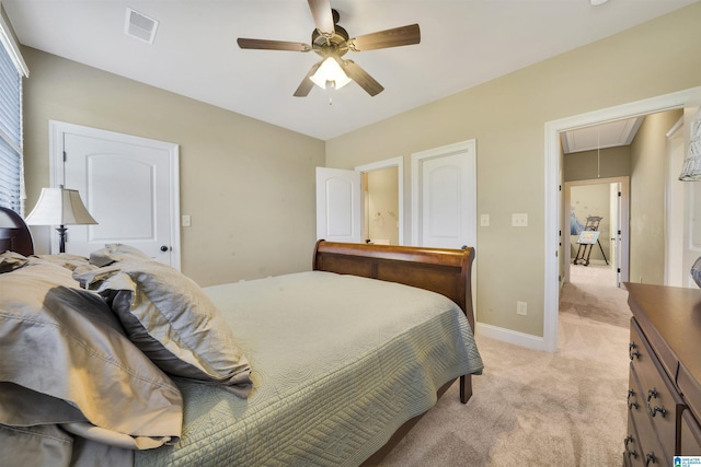 2399 Huntington Glen Dr, Homewood, AL 35226 - bedroom featuring attic access, light carpet, baseboards, and a ceiling fan