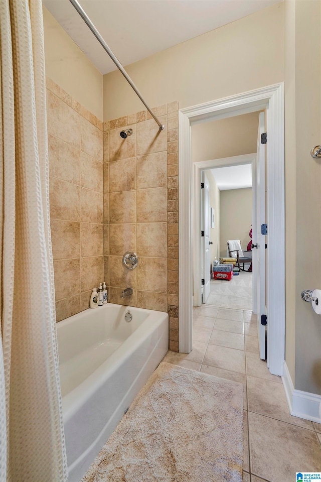 bathroom featuring tile patterned floors and shower / bathtub combination with curtain