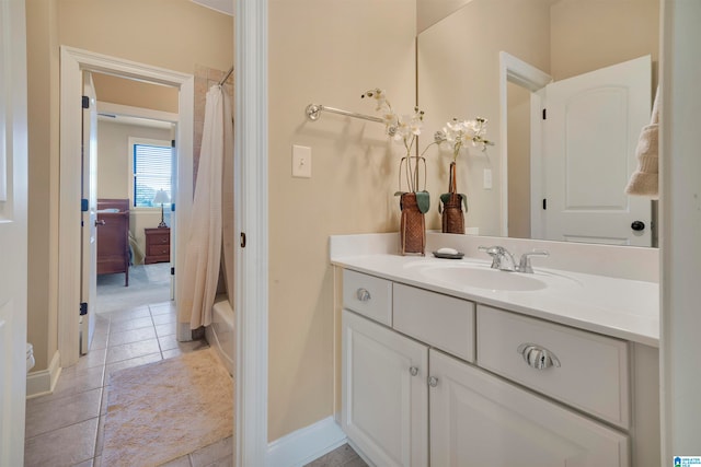 bathroom featuring tile patterned floors and vanity