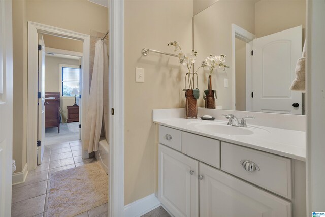 2399 Huntington Glen Dr, Homewood, AL 35226 - bathroom with vanity, tile patterned flooring, shower / tub combo, and baseboards