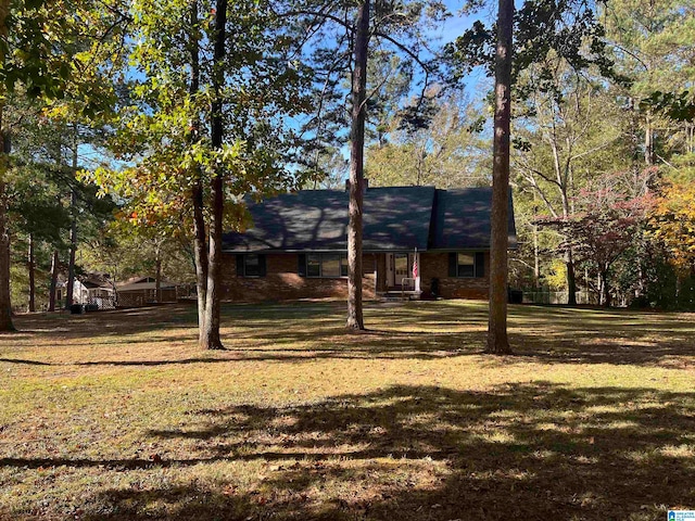 view of front of home with a front lawn