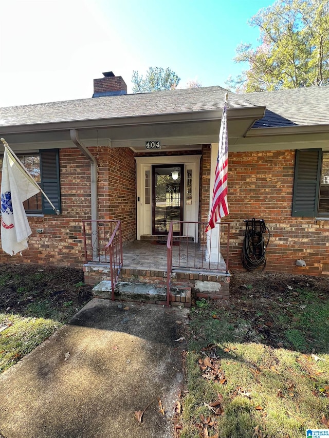 doorway to property featuring a porch