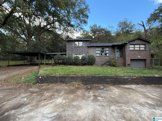 view of front of property with a front yard and a carport