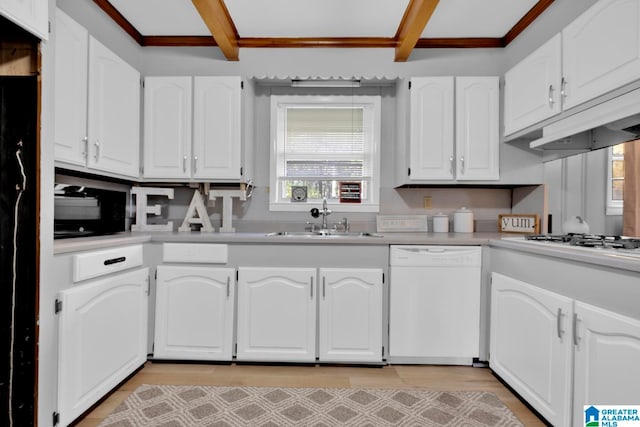 kitchen featuring dishwasher, white cabinetry, and sink