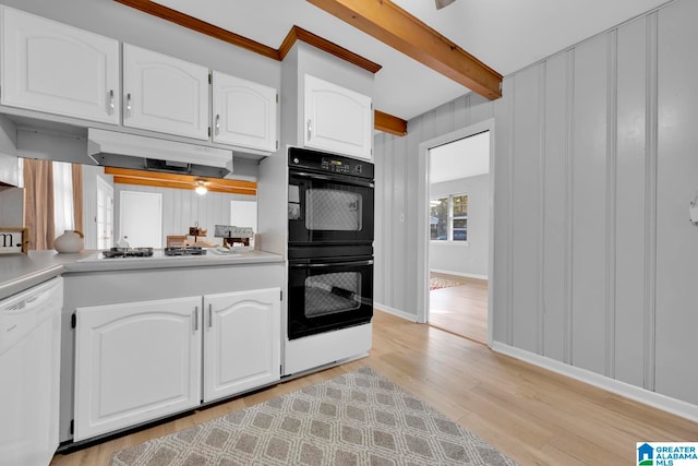 kitchen with white cabinetry, beamed ceiling, light hardwood / wood-style floors, and white appliances