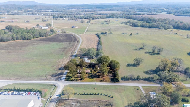 birds eye view of property featuring a rural view