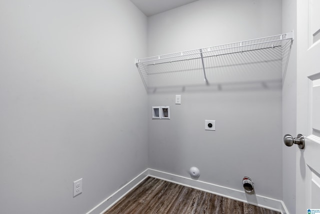 washroom featuring hookup for a washing machine, dark hardwood / wood-style flooring, gas dryer hookup, and electric dryer hookup