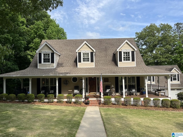 view of front facade with a front lawn and a porch