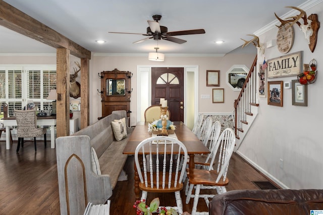 dining space with dark hardwood / wood-style floors, ceiling fan, and crown molding