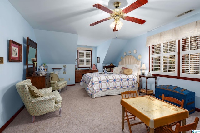 bedroom with carpet floors, ceiling fan, and lofted ceiling