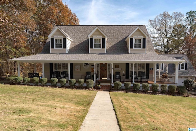 view of front of house featuring a porch and a front lawn