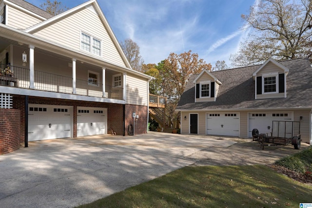 view of side of home featuring a garage