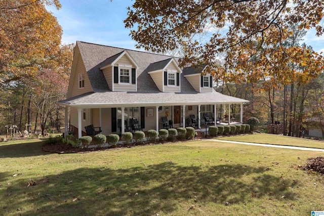 view of front of house featuring a front yard and a porch