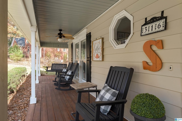 wooden terrace with ceiling fan