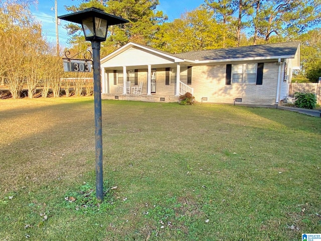 single story home featuring a front yard and a porch