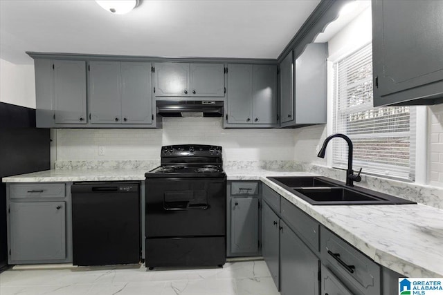 kitchen with sink, gray cabinets, range hood, and black appliances