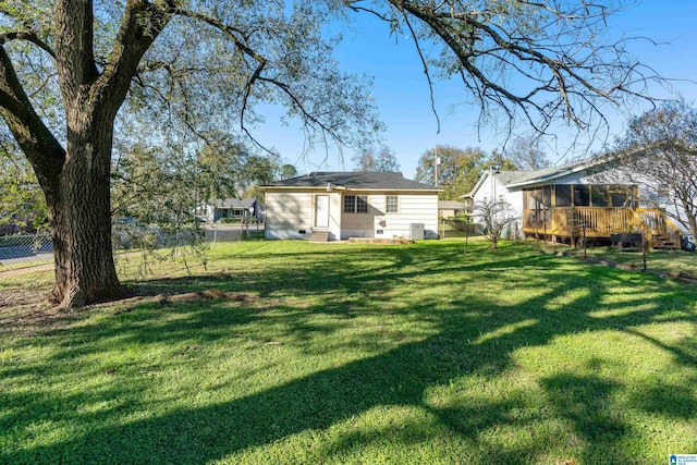 view of yard with a wooden deck