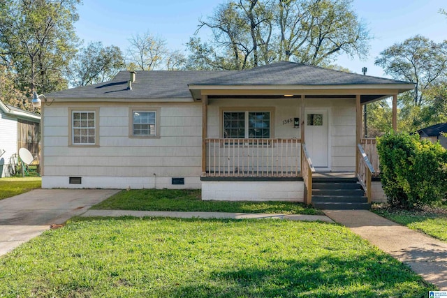 view of front facade with a porch and a front yard