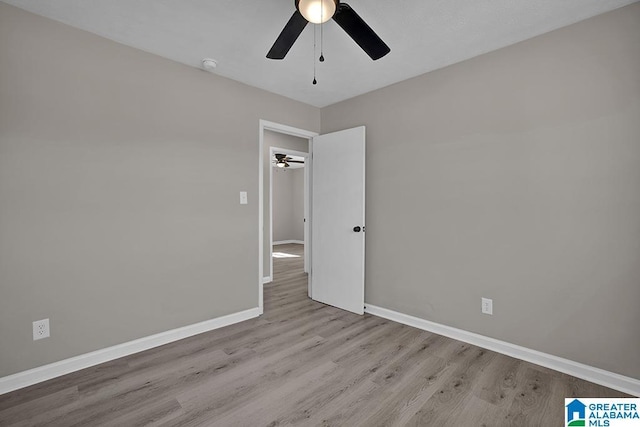 6129 Spruce Dr, Anniston, AL 36206 - spare room with ceiling fan, wood finished floors, baseboards, and a smoke detector