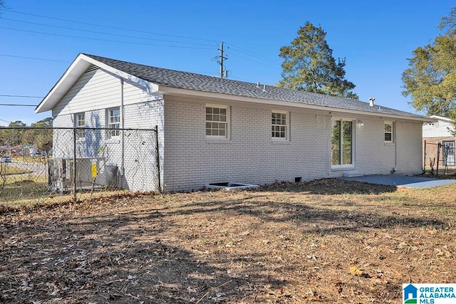 rear view of property featuring a patio