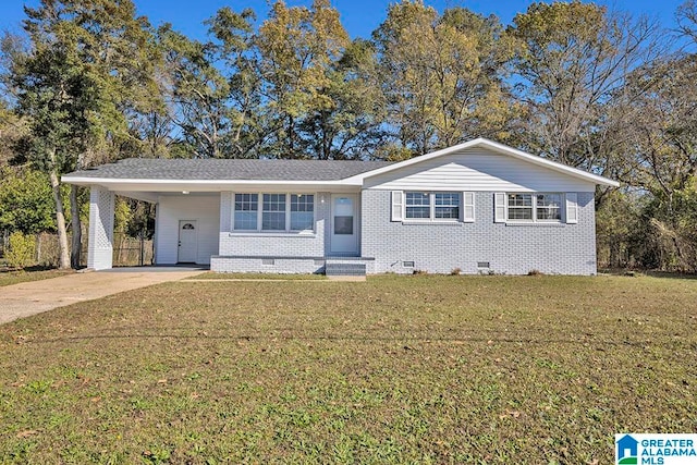 ranch-style home with a carport and a front lawn