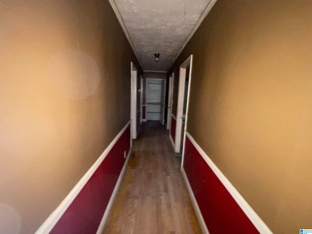 hallway featuring hardwood / wood-style flooring