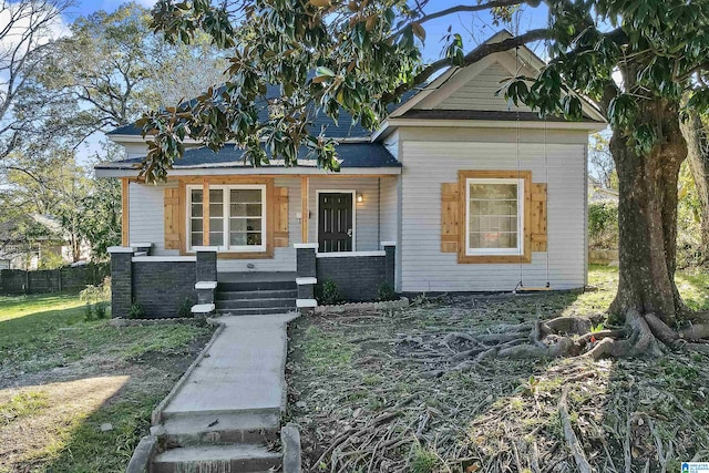 view of front of home featuring covered porch