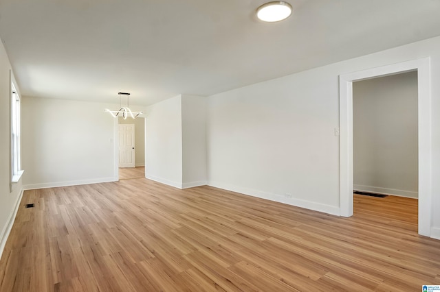 empty room with light wood-type flooring