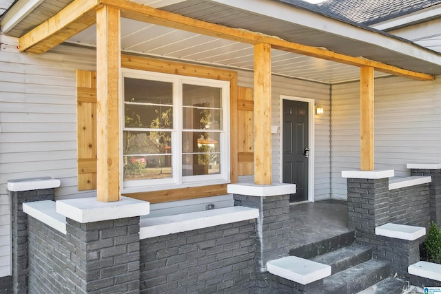 doorway to property featuring a porch