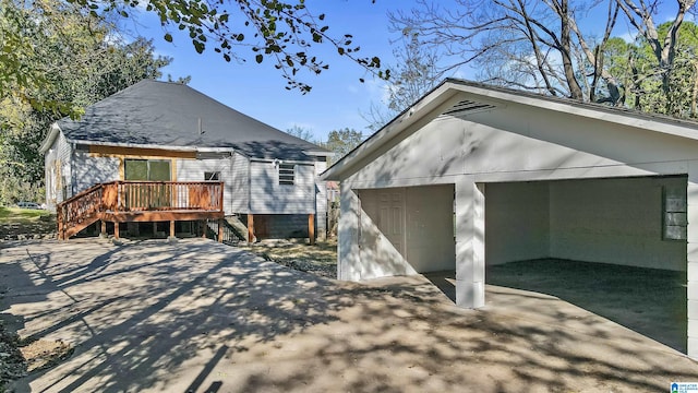 back of property with a wooden deck